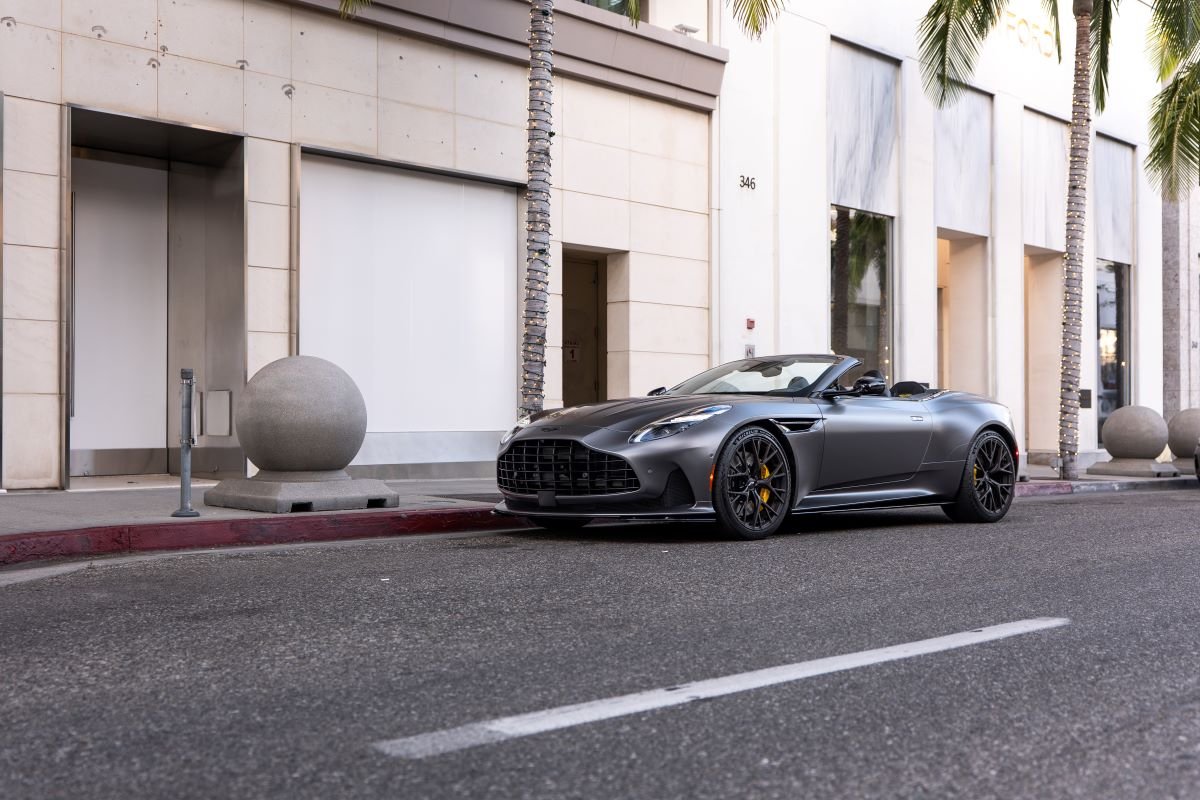 Grey Aston Martin DB12 Volante side profile, rental in Los Angeles
