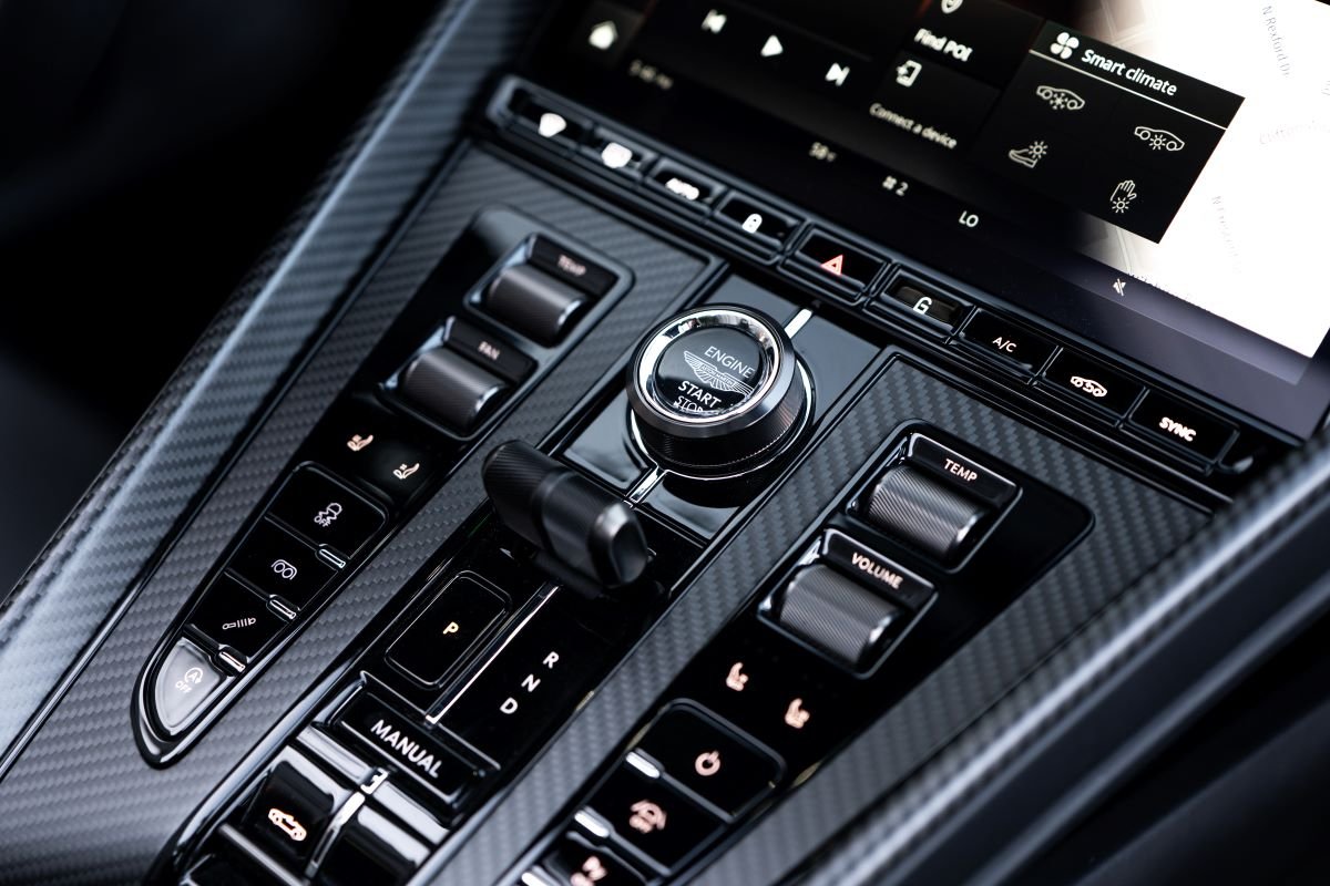 Grey Aston Martin DB12 Volante interior center console, rental in Los Angeles