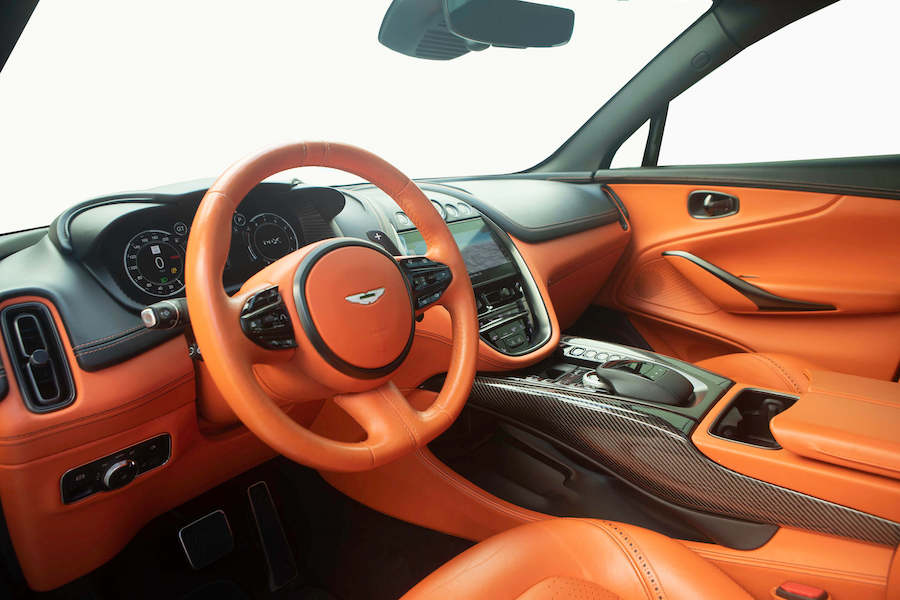 Grey Aston Martin DBX interior steering wheel, rental in Los Angeles