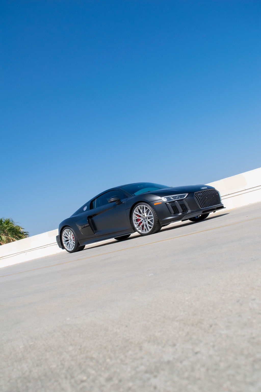 Black Audi R8 V10 Coupe, a 2 door supercar for hire in Orange County