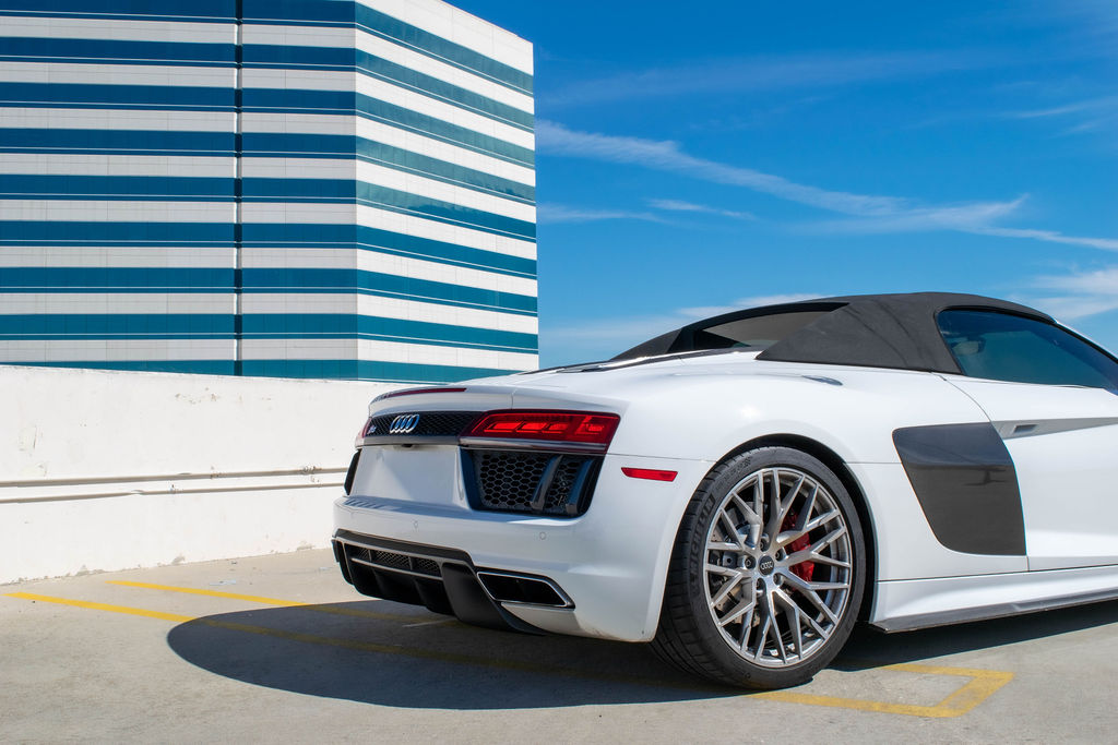 White Audi R8 V10 Spyder, a 2 door supercar for hire in Orange County