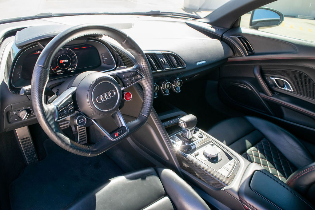 Audi R8 V10 Spyder supercar in White, available for rental in Orange County, CA