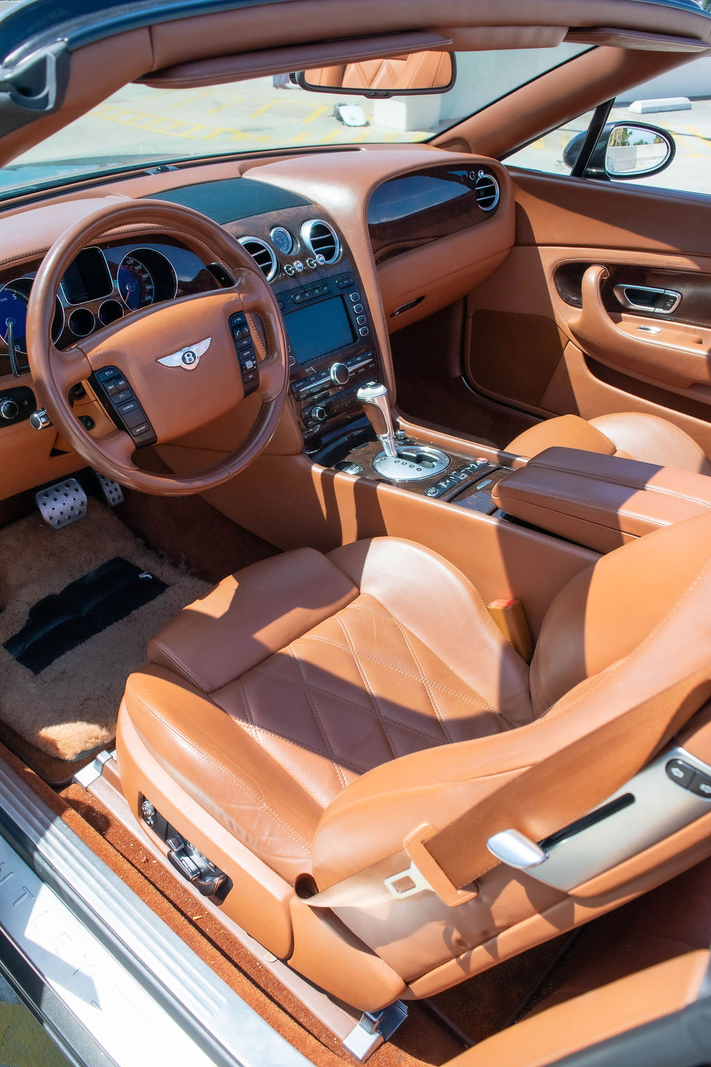 Black Bentley Continental GTC convertible luxury sedan for rent in Orange County