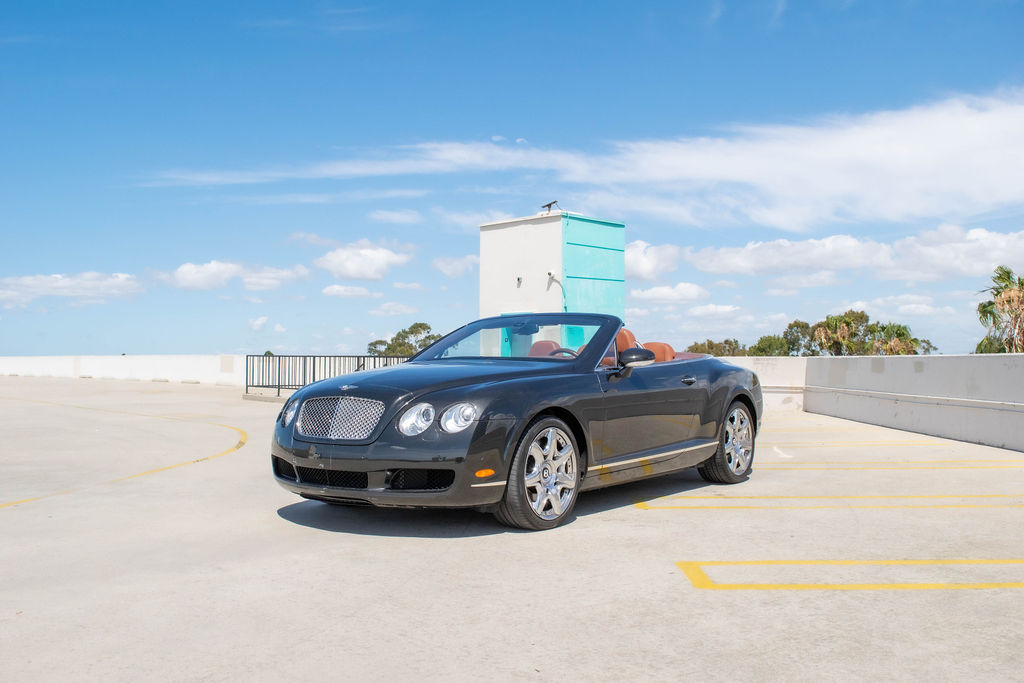 Black Bentley Continental GTC with AWD drivetrain, luxury sedan rental in Orange County