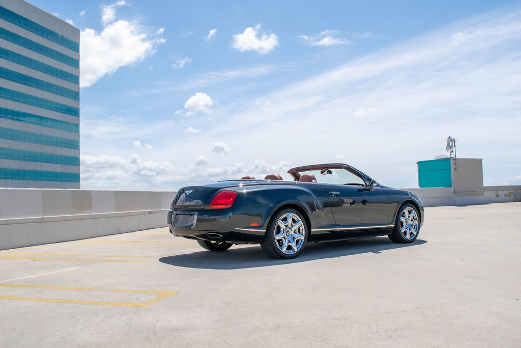 Black Bentley Continental GTC, a 2 door luxury sedan for hire in Orange County