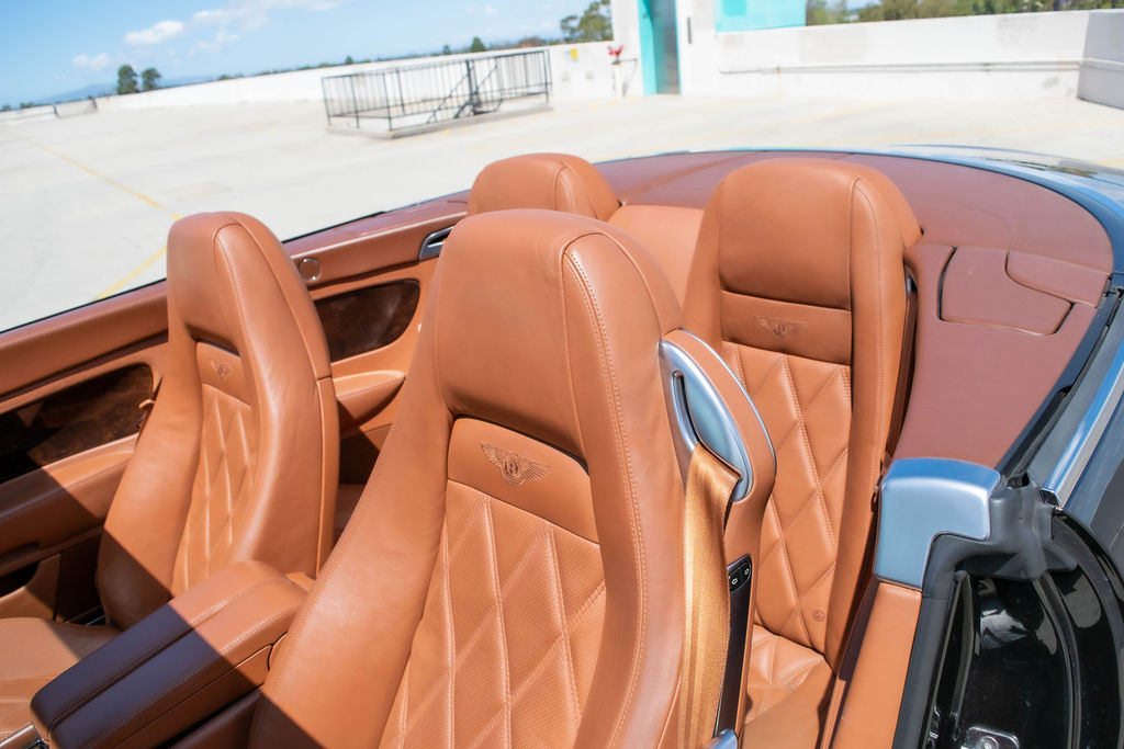 Black Bentley Continental GTC luxury sedan with 4 seat cabin, Orange County rental
