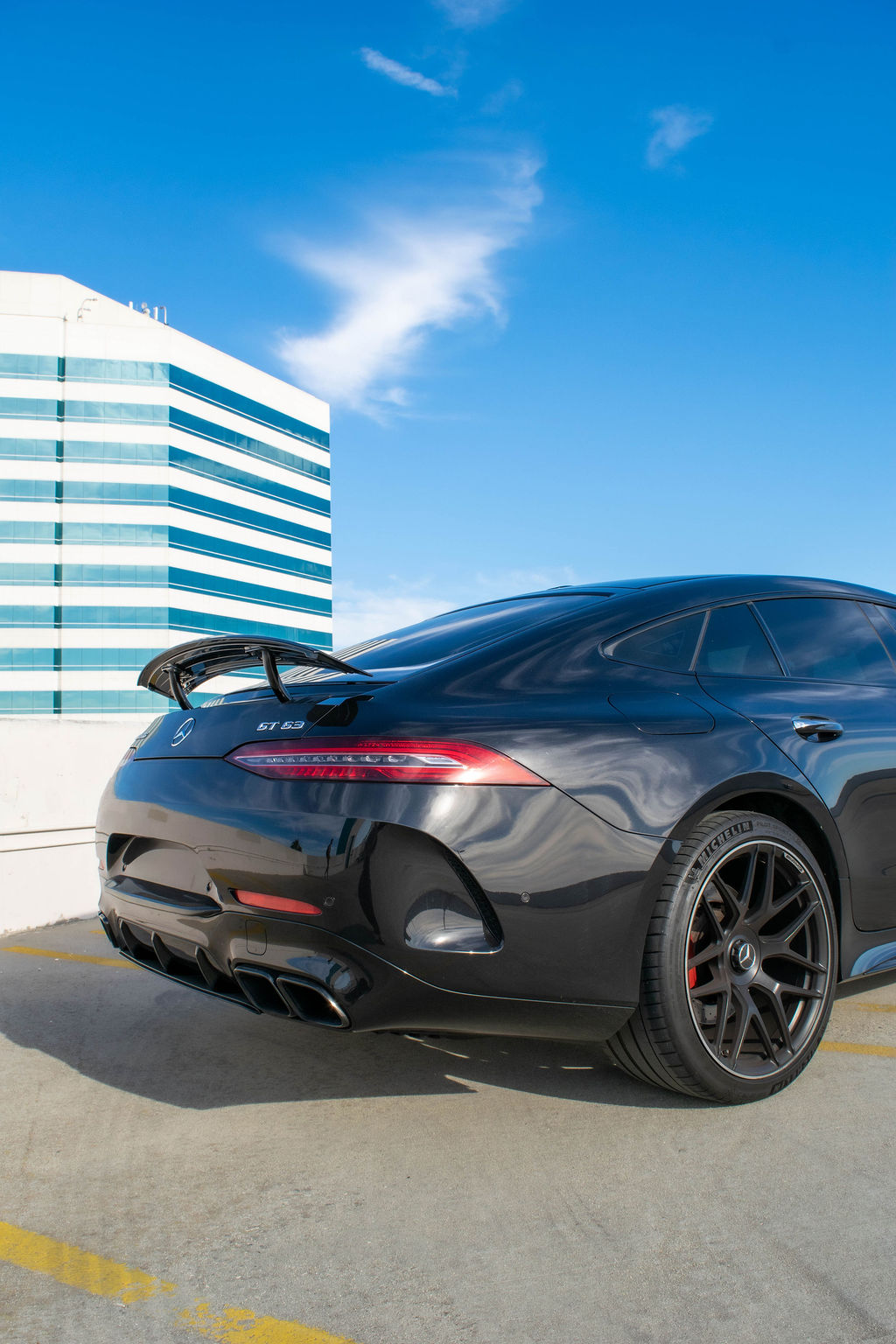 Black Mercedes-Benz AMG GT 63, AWD 4 seat rental