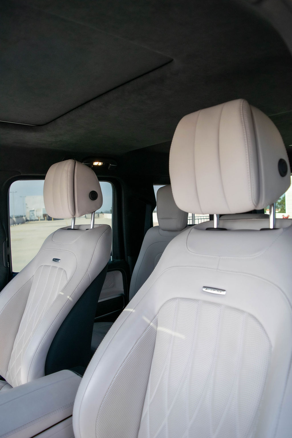 Blue Mercedes-Benz G-Wagon AMG G63 with White interior