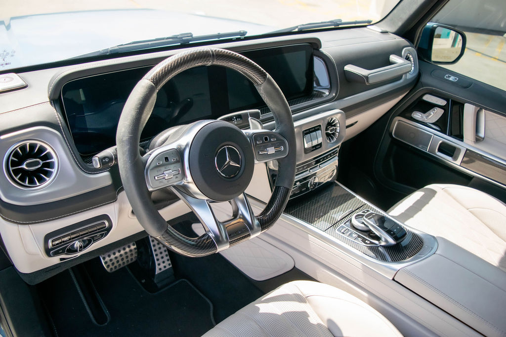 Blue Mercedes-Benz G-Wagon AMG G63 4WD luxury SUV rental in Orange County