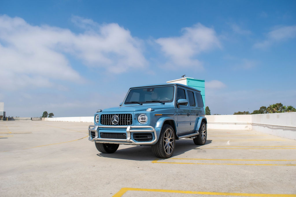 Blue Mercedes-Benz G-Wagon AMG G63 luxury SUV with White interior