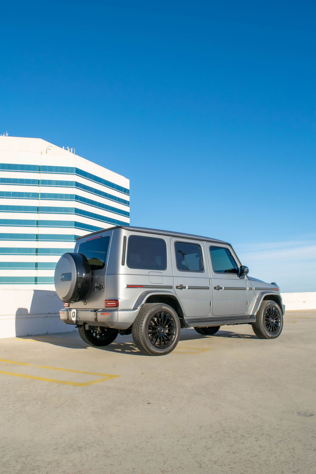 Grey Mercedes-Benz G-Wagon G550 luxury SUV with Black interior