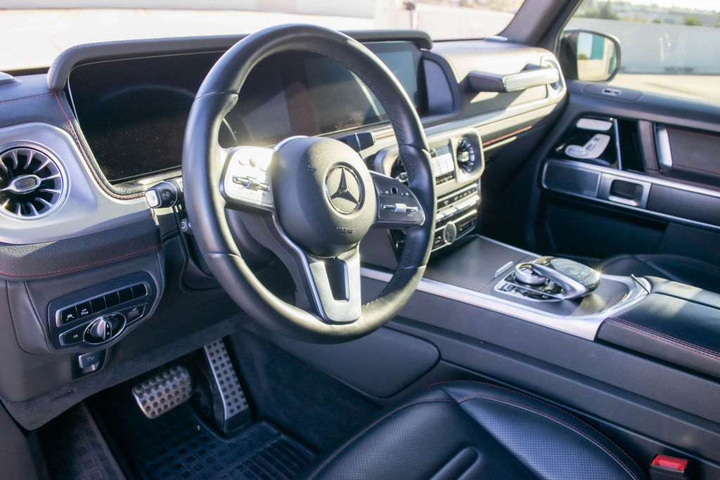 Grey Mercedes-Benz G-Wagon G550 4 door luxury SUV