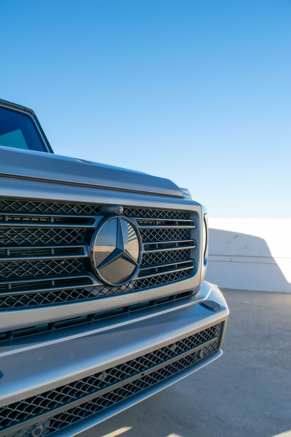 Grey Mercedes-Benz G-Wagon G550 luxury SUV, Black interior and 5 seats