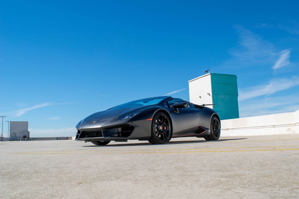 Black Lamborghini Huracan Spyder AWD supercar rental in Orange County