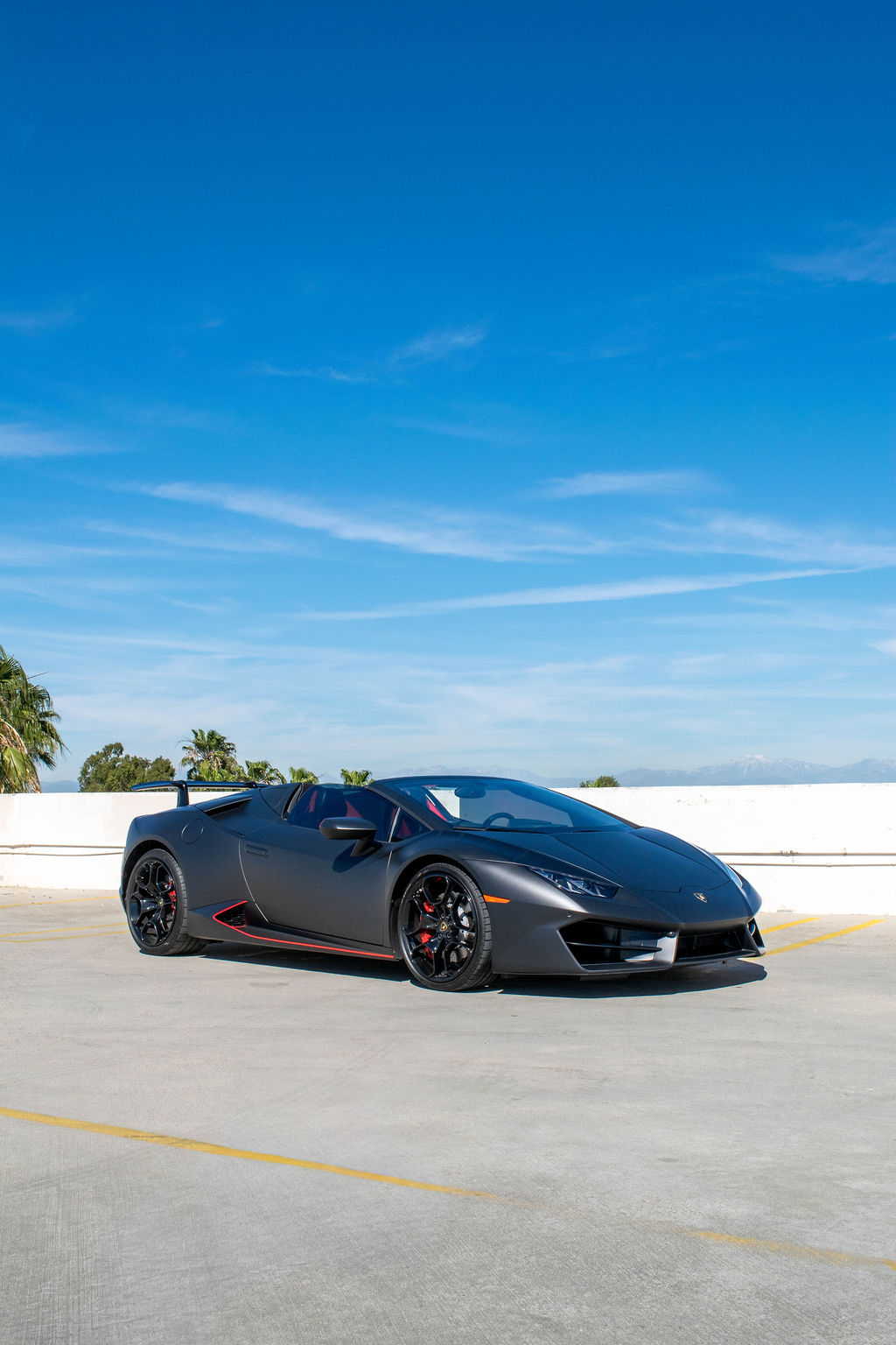 Black Lamborghini Huracan Spyder 2 seat supercar available in Orange County