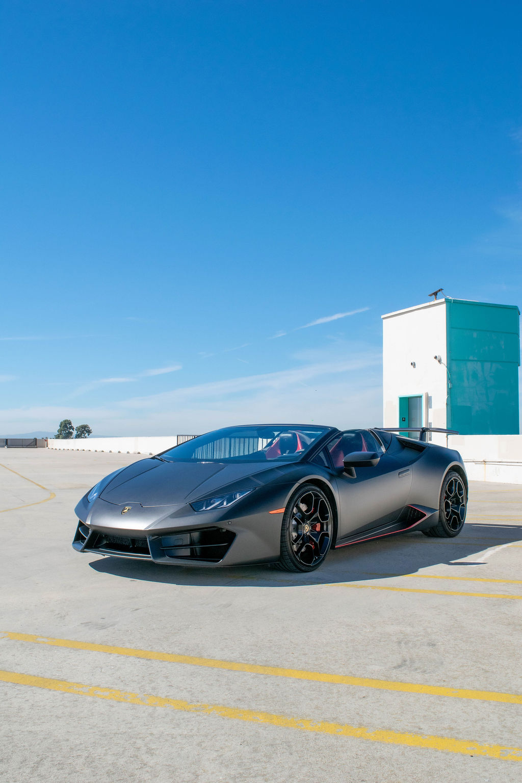 Black Lamborghini Huracan Spyder 2 door supercar