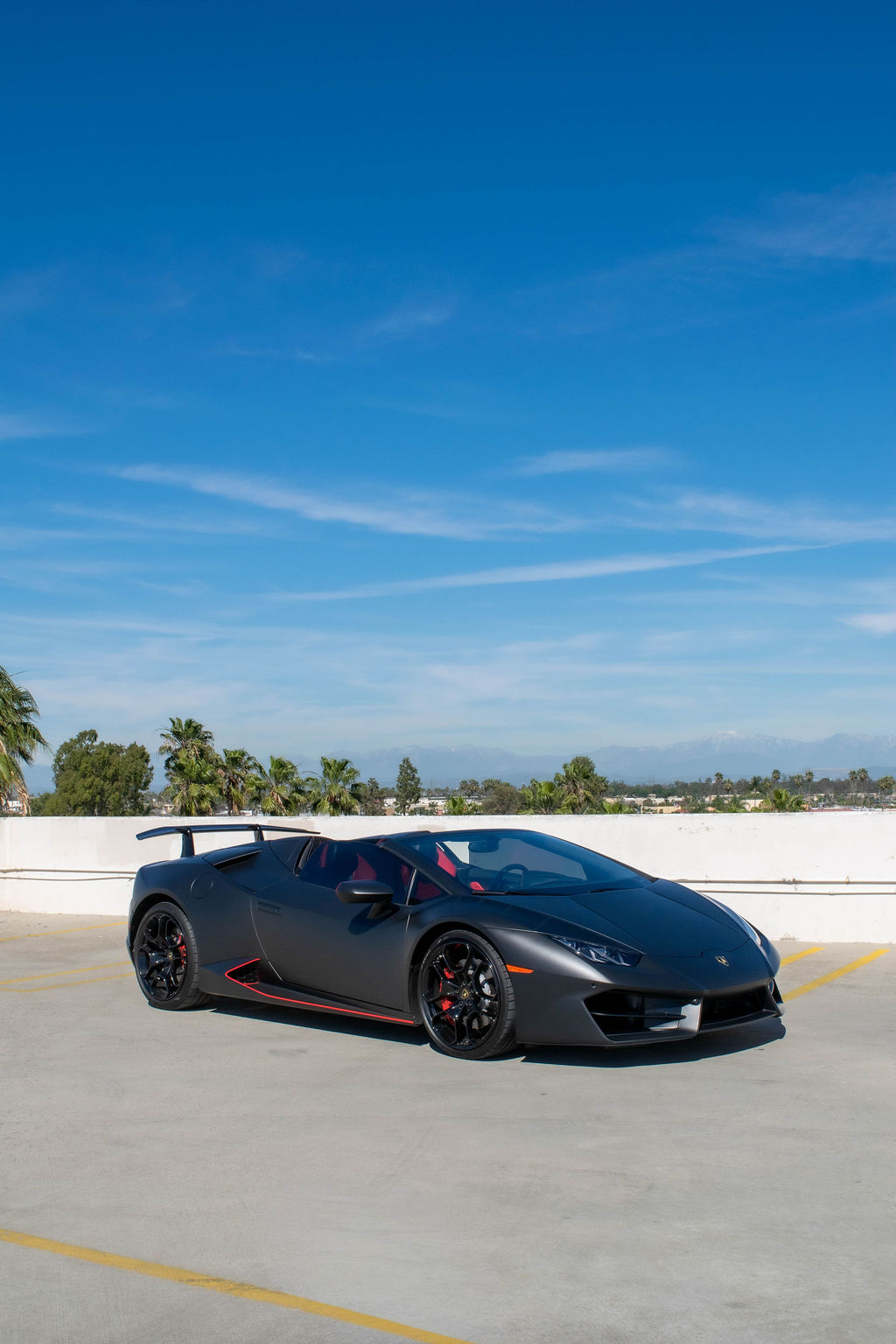 Black Lamborghini Huracan Spyder supercar available across Orange County