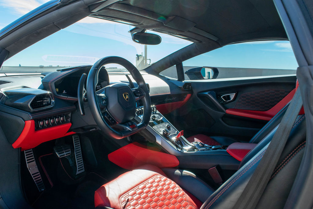 Black Lamborghini Huracan Spyder supercar for hire in Orange County