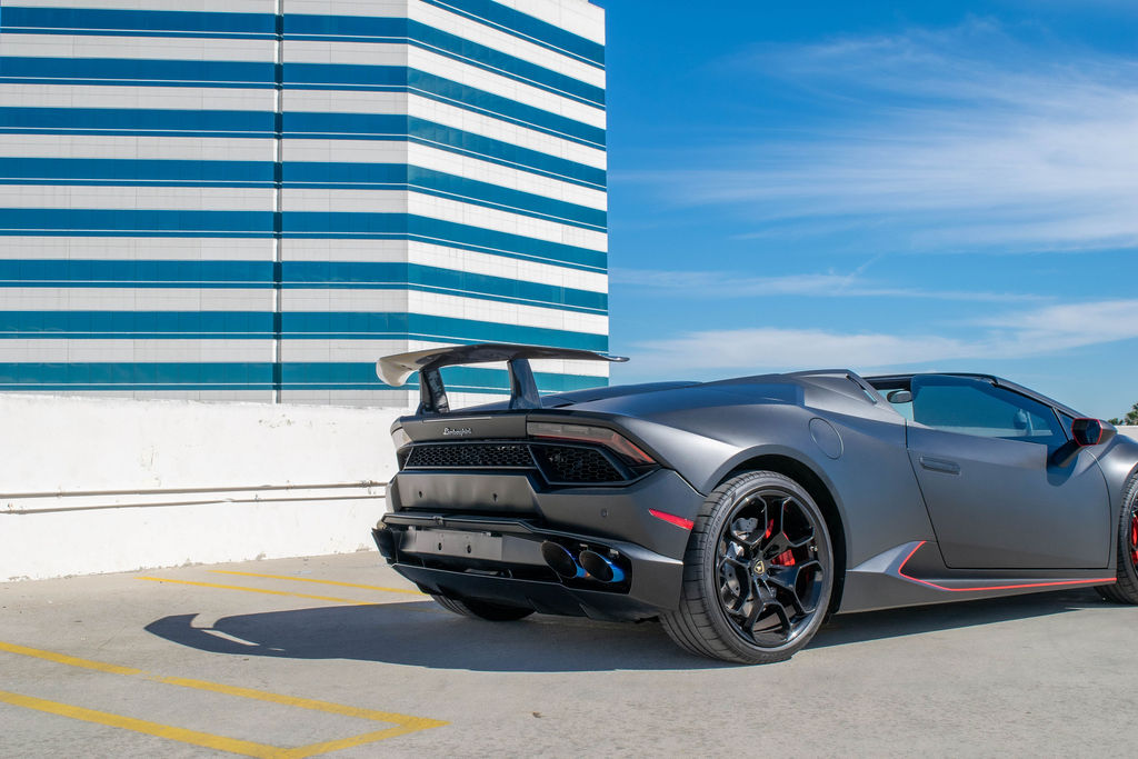 Black Lamborghini Huracan Spyder AWD supercar for rent in Orange County