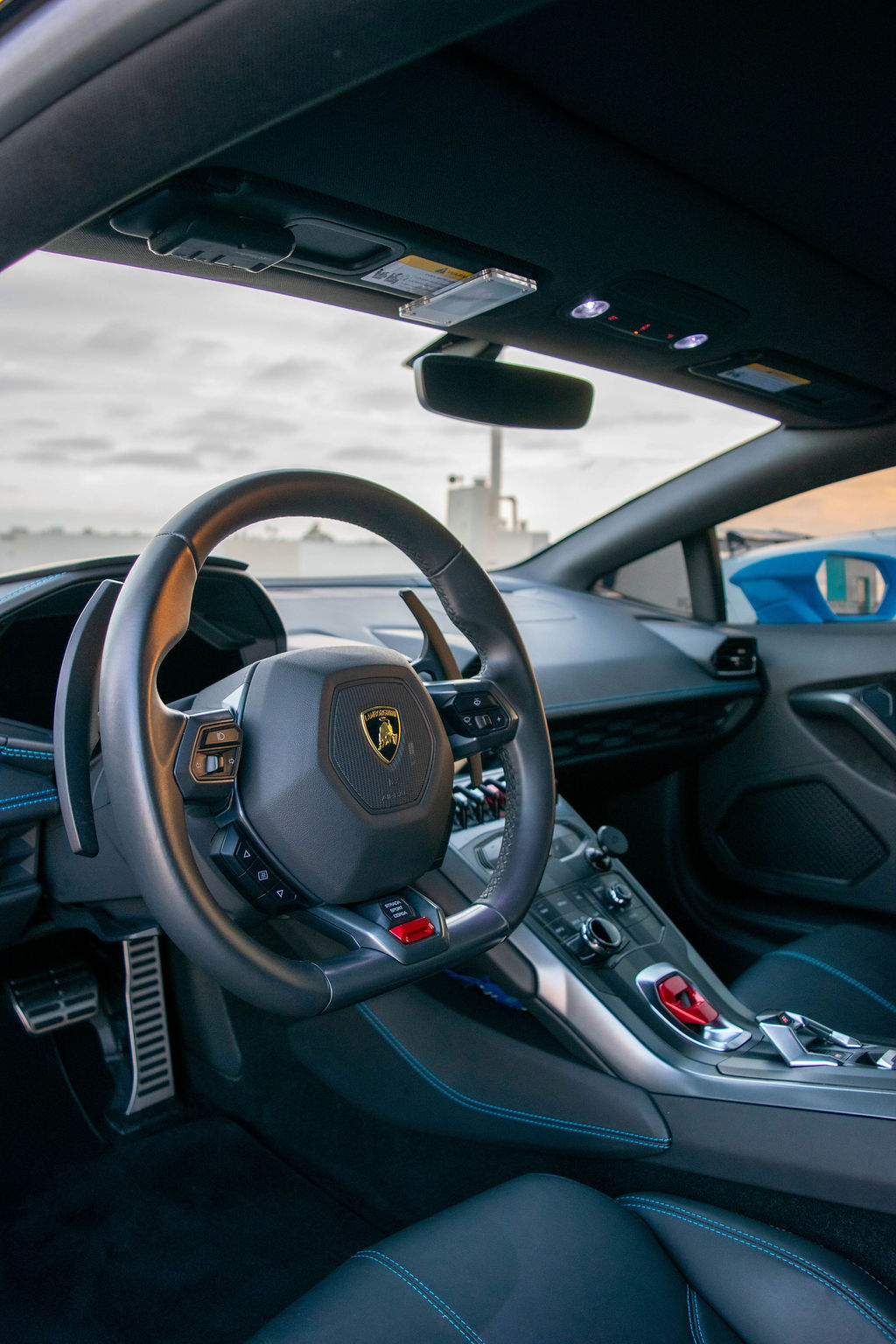 Pink Lamborghini Huracan supercar with Black interior