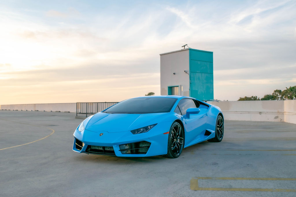 Pink Lamborghini Huracan AWD supercar with Black interior