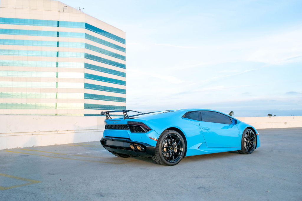 Pink Lamborghini Huracan supercar rental delivered in Orange County