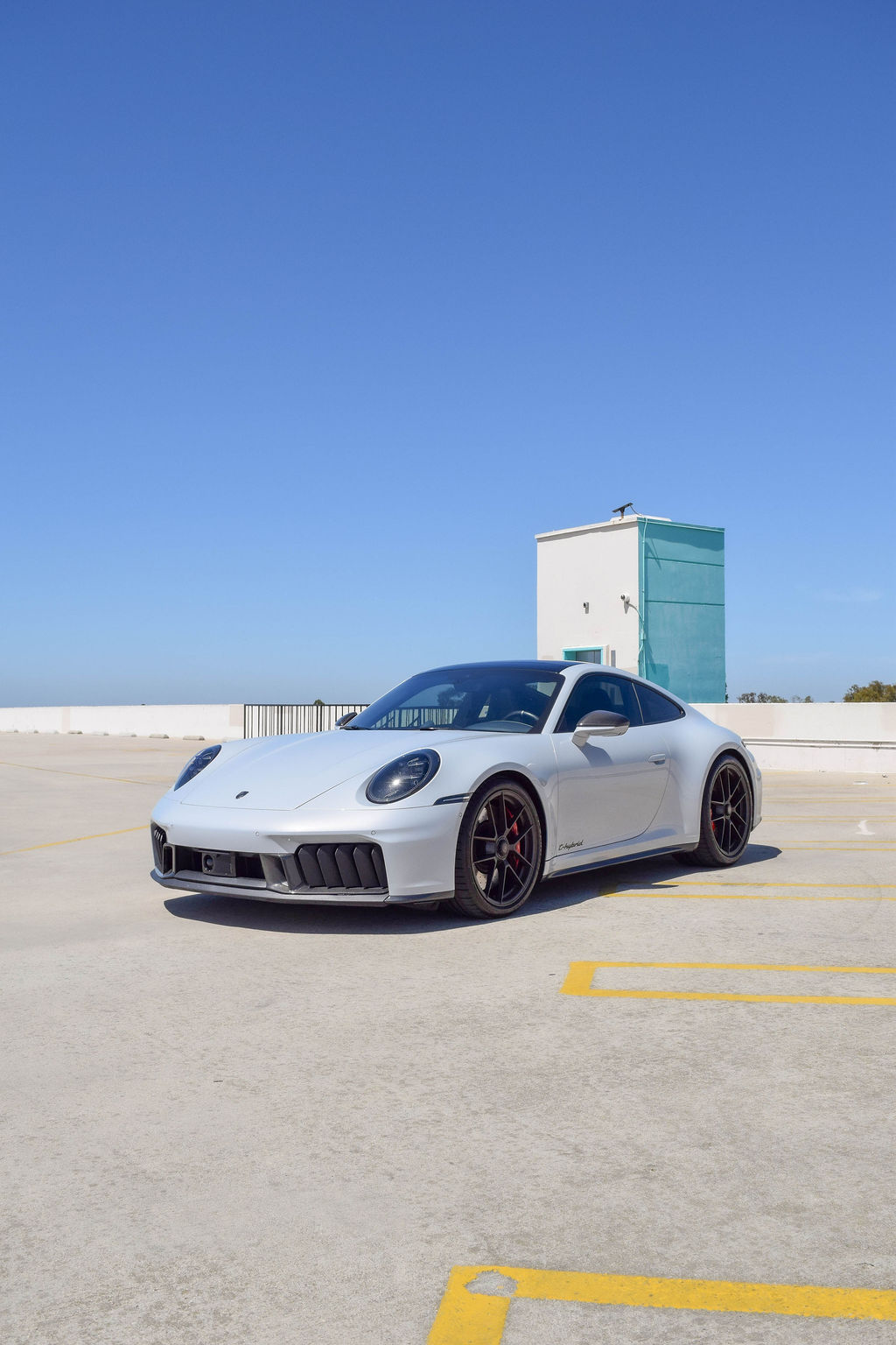 Grey Porsche 911 Carrera GTS, RWD 4 seat rental
