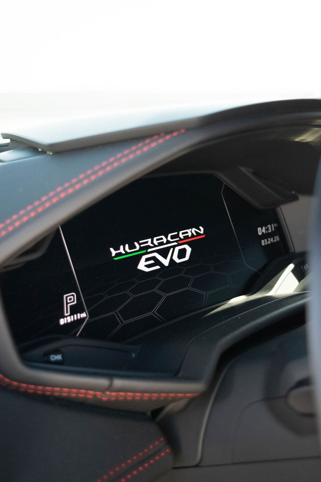 Black Lamborghini Huracan Evo with Black and Red interior