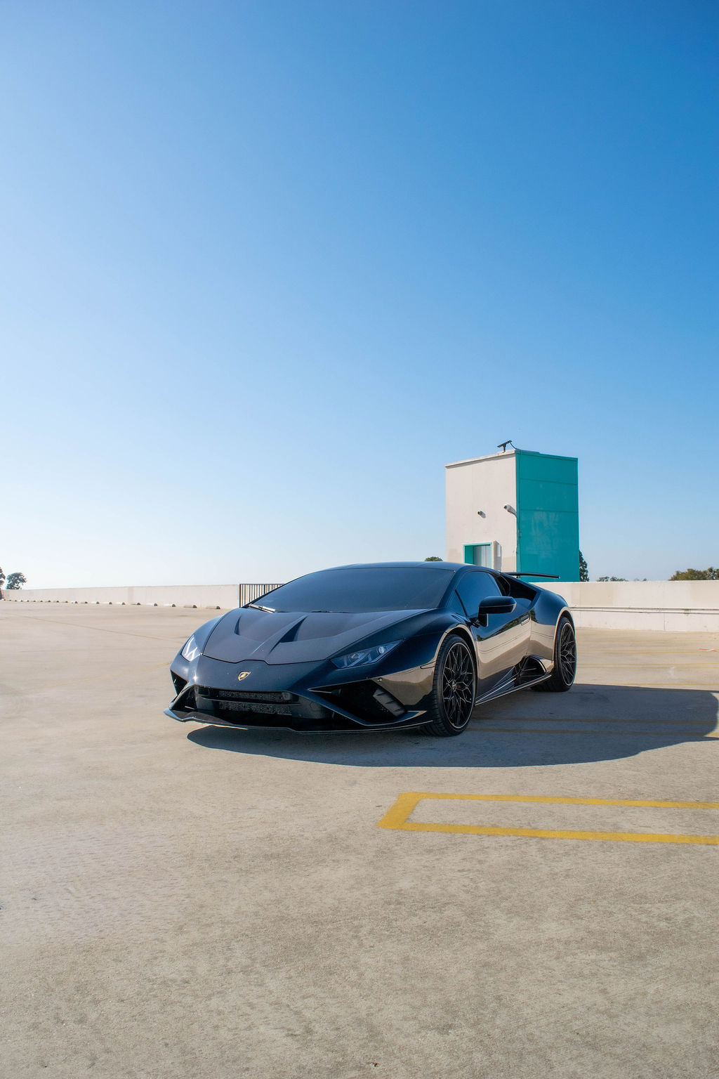 Black Lamborghini Huracan Evo supercar with Black and Red interior
