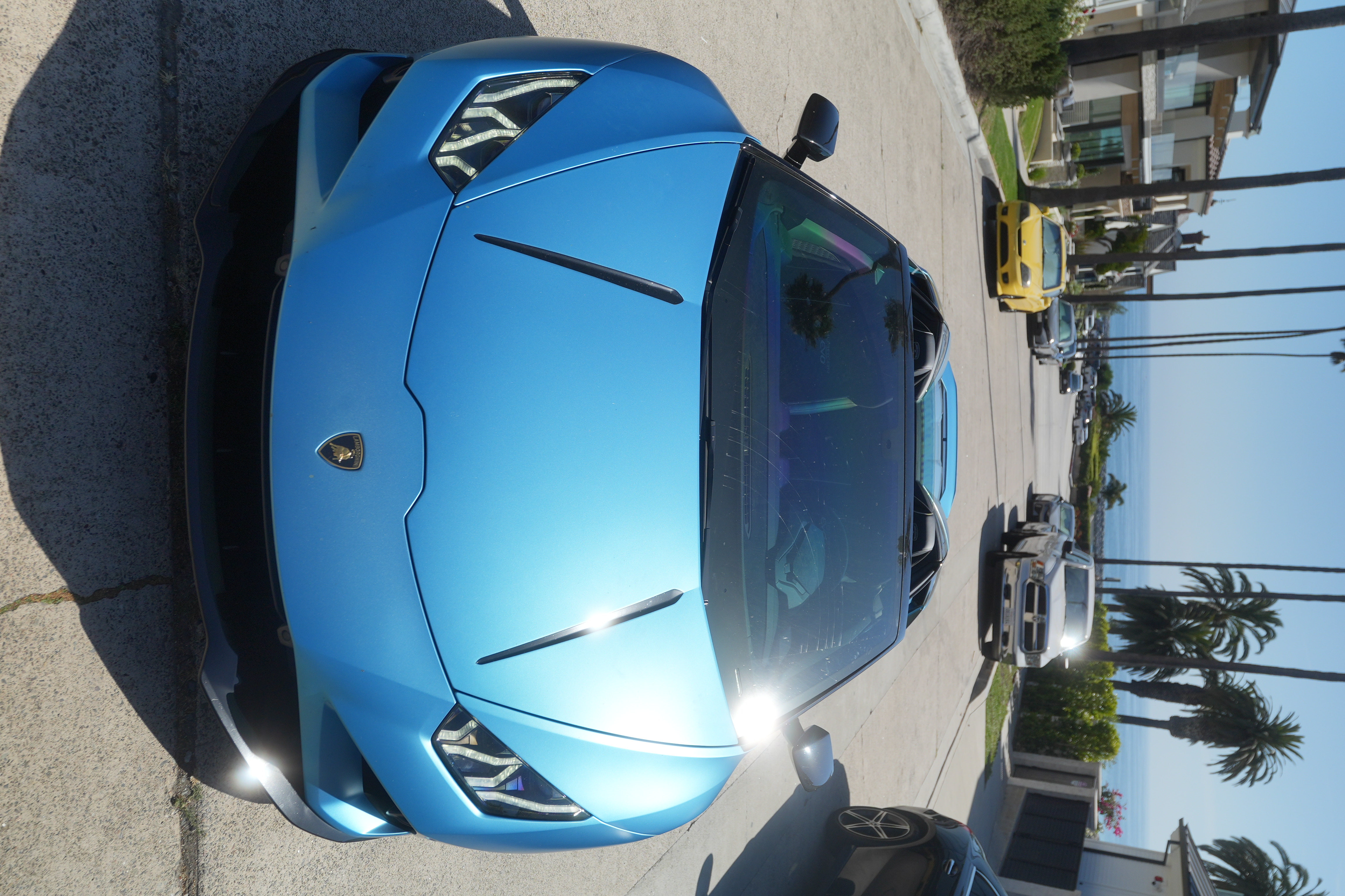 Blue Lamborghini Huracan Evo Spyder open top supercar with Black interior