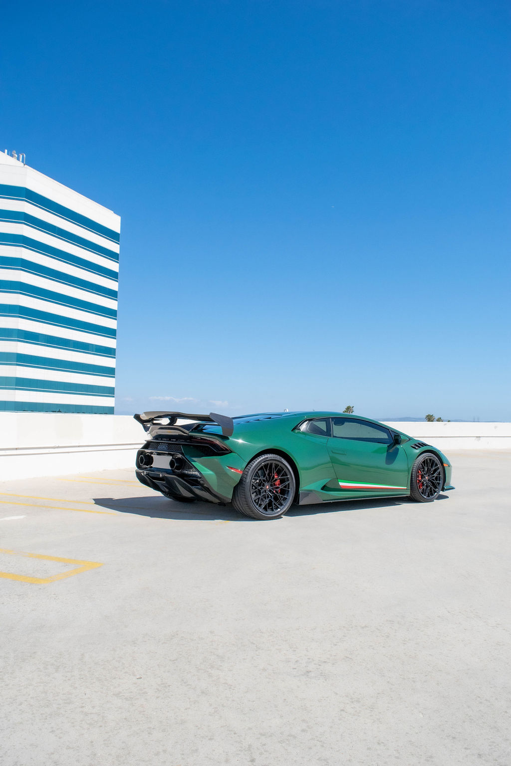Green Lamborghini Huracan, Budget luxury cars vs a specialist exotic rental