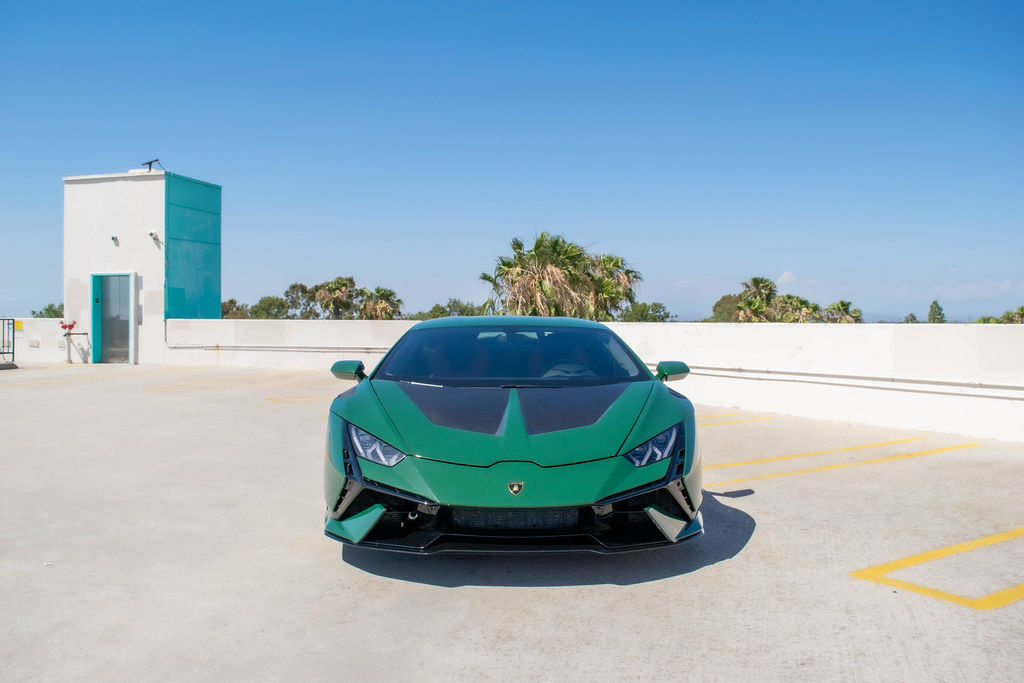 Green Lamborghini Huracan AWD supercar with Black interior