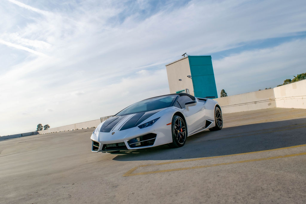 White Lamborghini Huracan Spyder with Black and Red interior