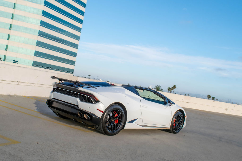 White Lamborghini Huracan Spyder 2 seat supercar available in Orange County