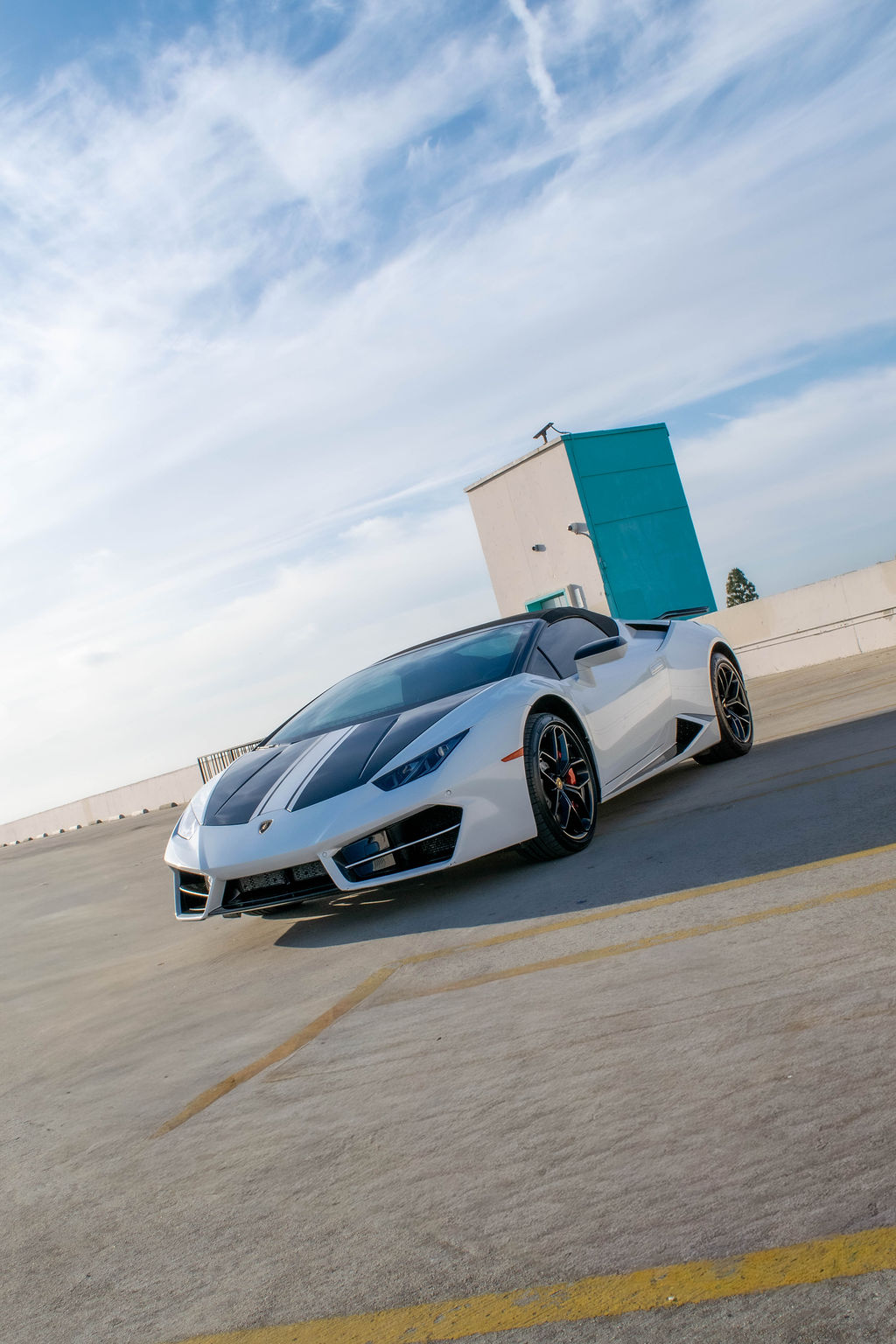 White Lamborghini Huracan Spyder supercar rental delivered in Orange County
