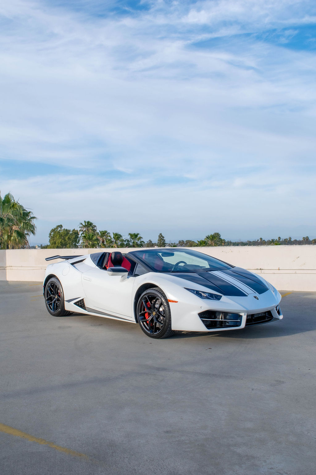 White Lamborghini Huracan Spyder supercar for hire in Orange County
