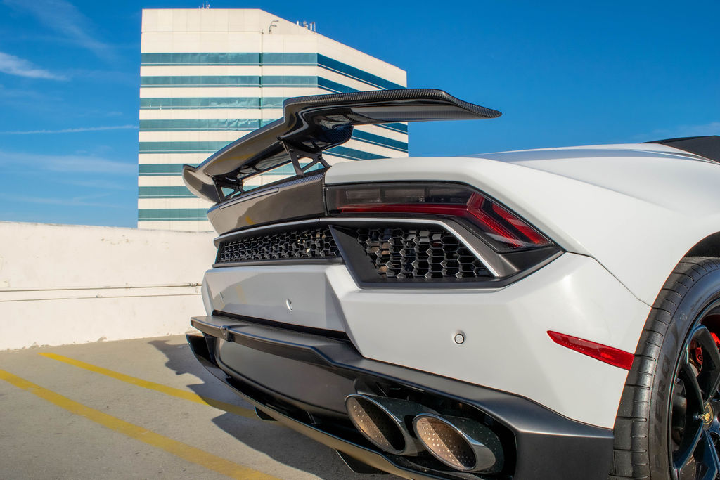 White Lamborghini Huracan Spyder supercar available to rent in Orange County