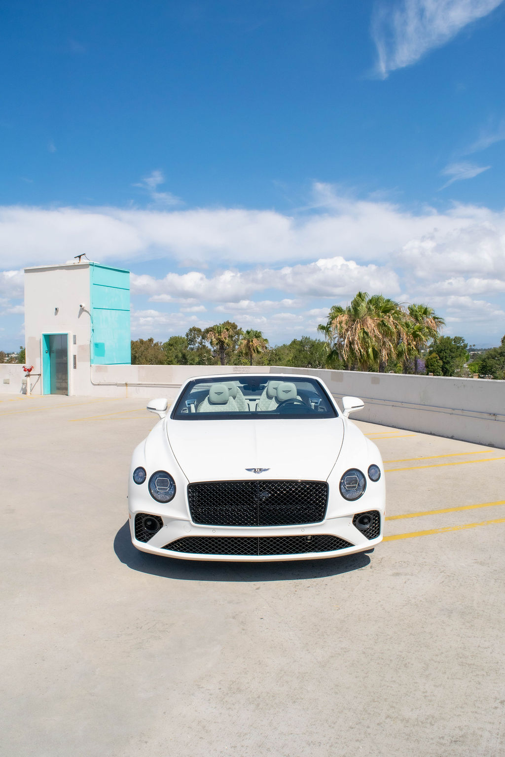 White Bentley Continental GTC First Edition with AWD drivetrain, luxury sedan rental in Orange County