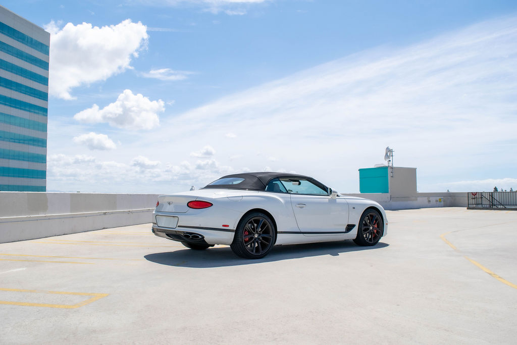 Bentley Continental GTC First Edition luxury sedan in White, available for rental in Orange County, CA