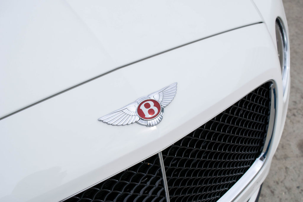 Bentley Continental GTC luxury sedan in White, available for rental in Orange County, CA
