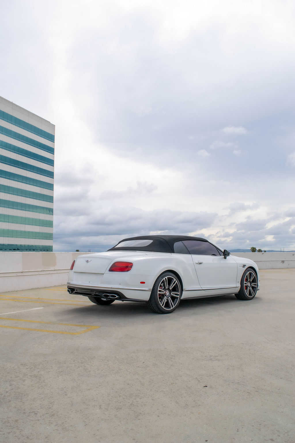 White Bentley Continental GTC AWD luxury sedan, exotic rental in Orange County