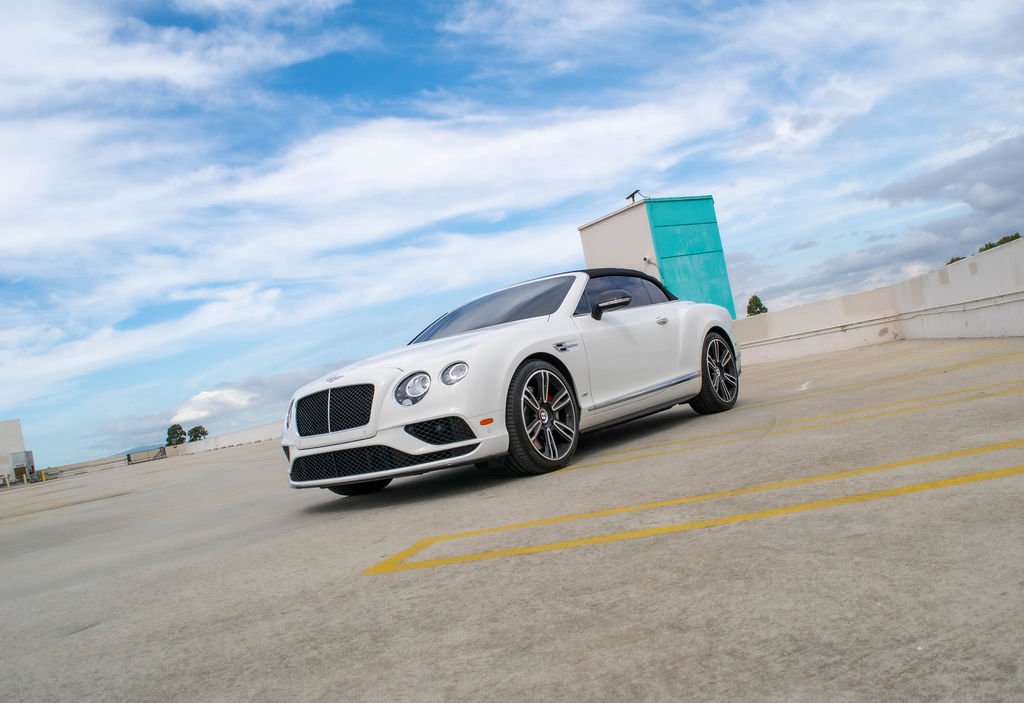 White Bentley Continental GTC luxury sedan rental delivered across Orange County, CA