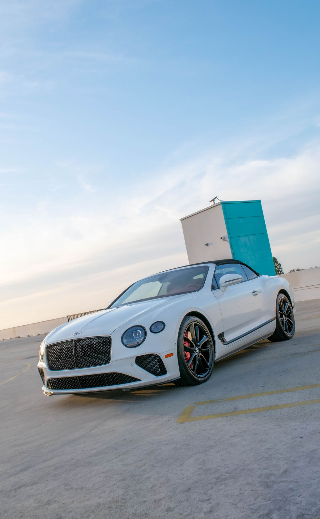 White Bentley Continental GTC convertible luxury sedan for rent in Orange County, Red interior