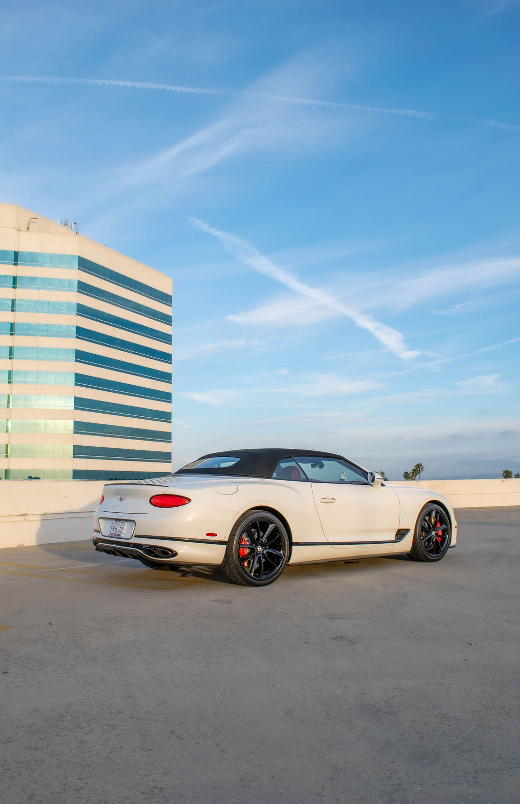 White Bentley Continental GTC luxury sedan, Red cabin, delivered in Orange County
