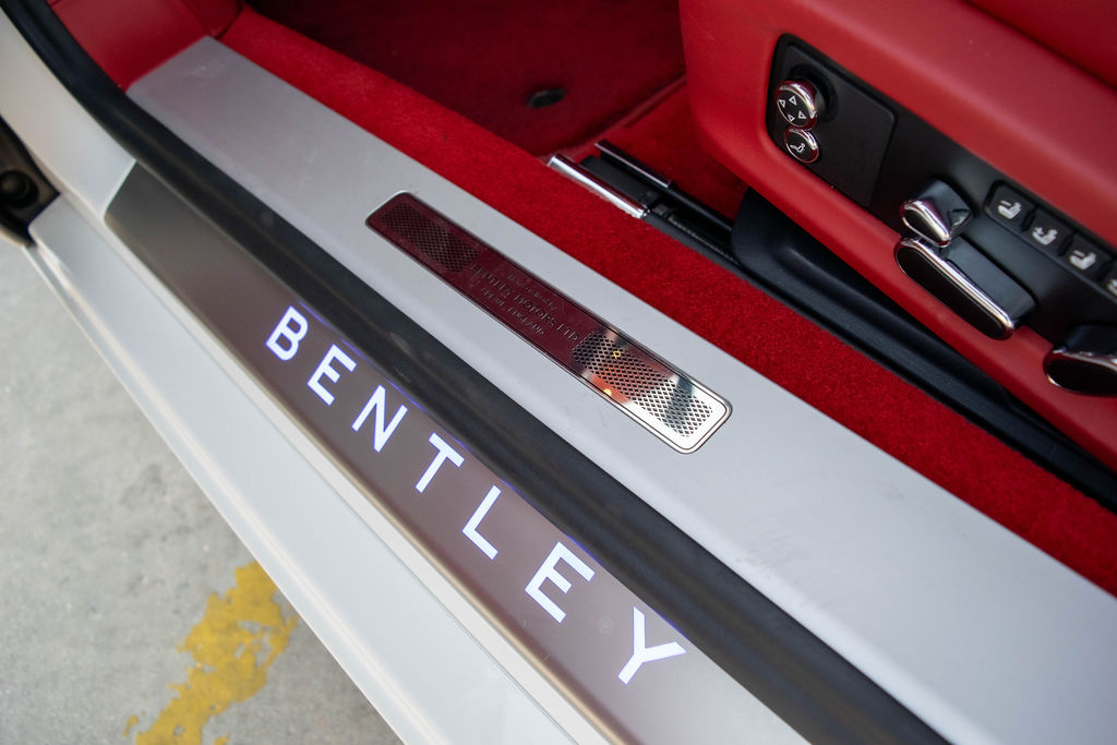 White Bentley Continental GTC AWD luxury sedan, exotic rental in Orange County, Red interior