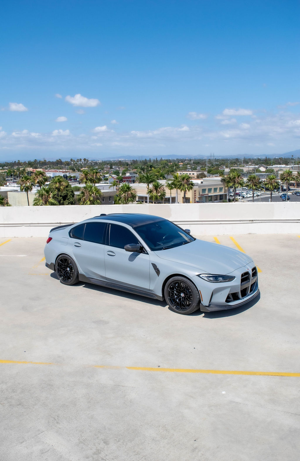 Grey BMW M3 Competition sports car available to rent across Orange County, CA