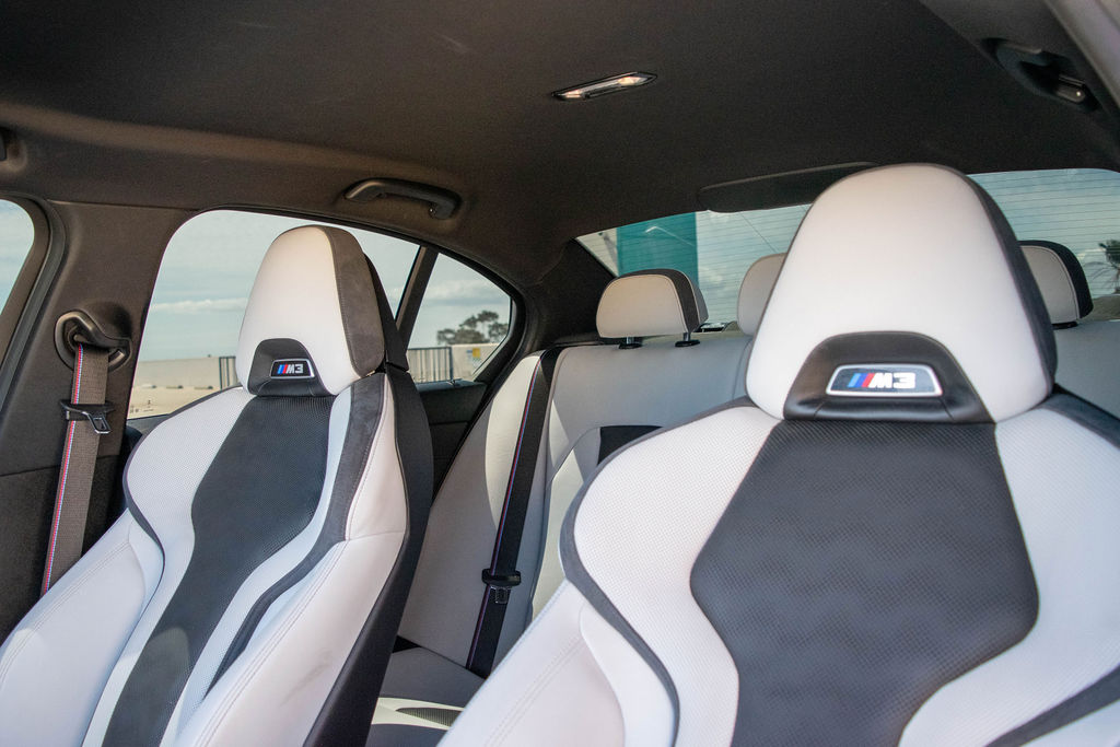 Grey BMW M3 Competition sports car, White cabin, delivered in Orange County