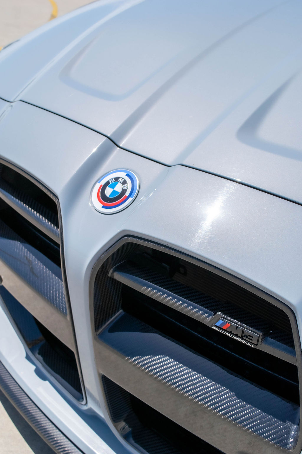 Grey BMW M3 Competition with RWD drivetrain, sports car rental in Orange County
