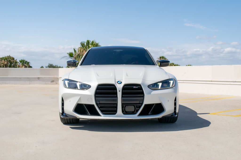 White BMW M3 Competition sports car with 5 seat cabin, Orange County rental