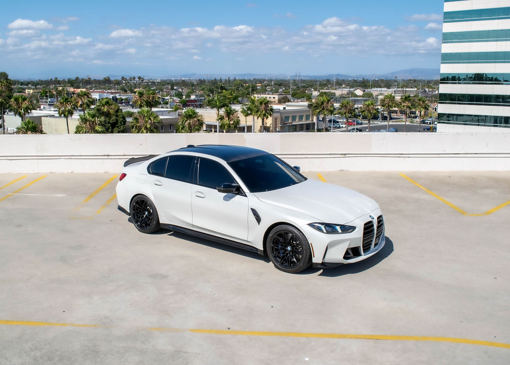 White BMW M3 Competition AWD sports car, exotic rental in Orange County